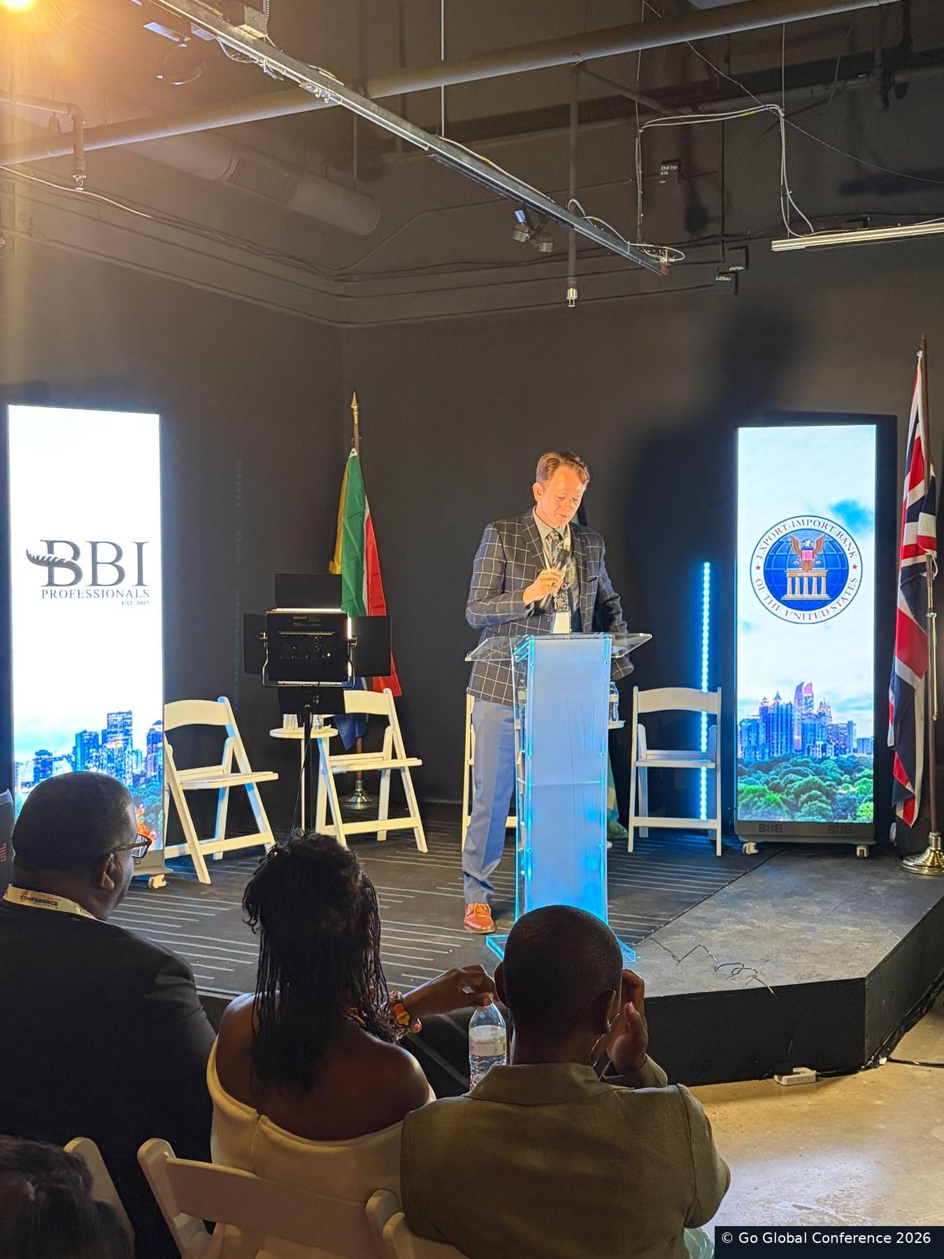 Guests listening to welcome remarks · GGC 2026