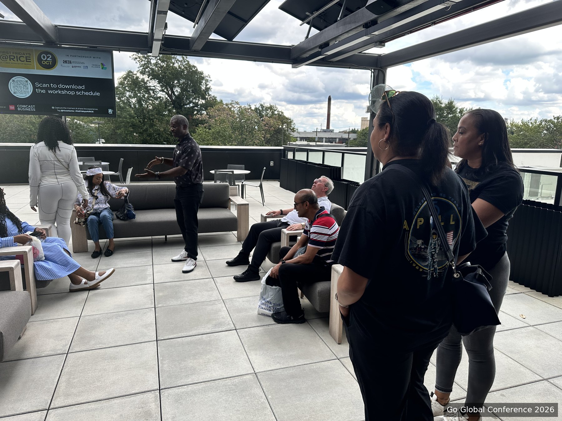 Delegates meeting on the Russell Center terrace · GGC 2026