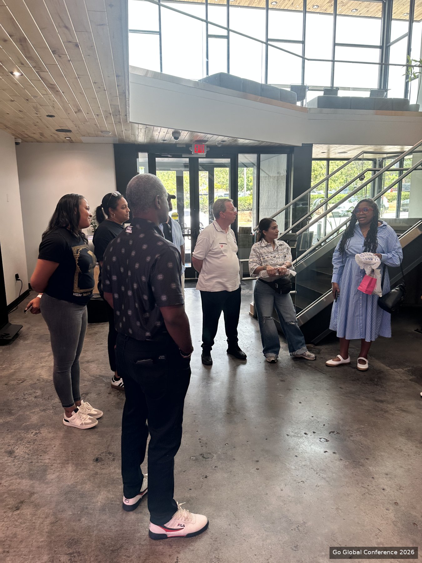 The delegation together inside the Russell Center · GGC 2026