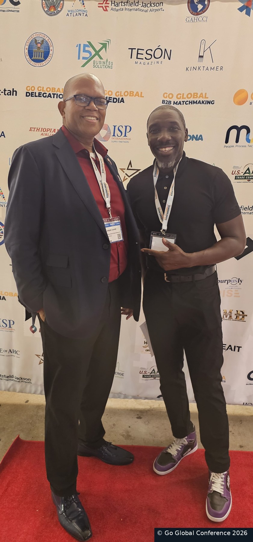 Guests at the conference backdrop · GGC 2026