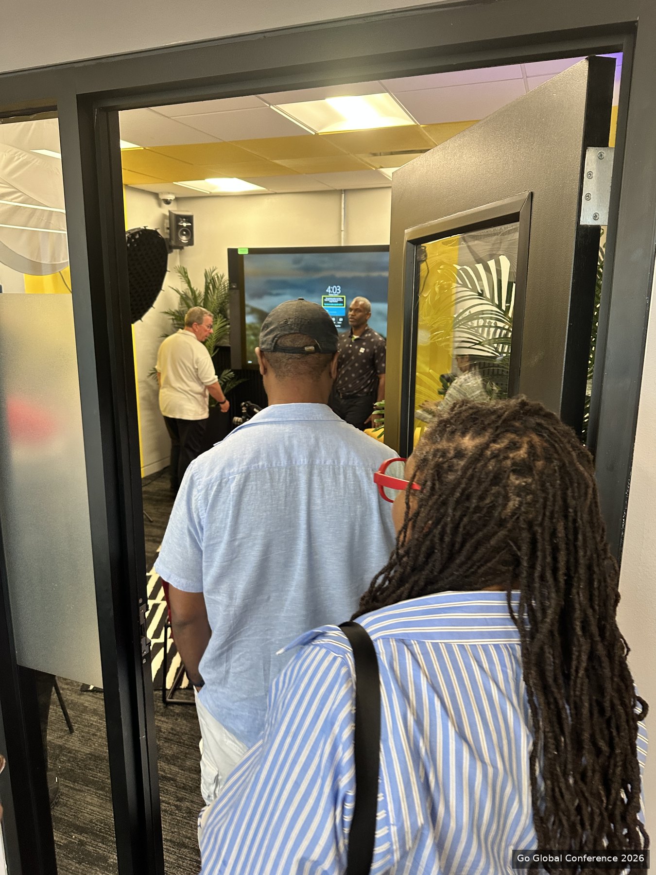 Delegates entering the Russell Center media studio · GGC 2026