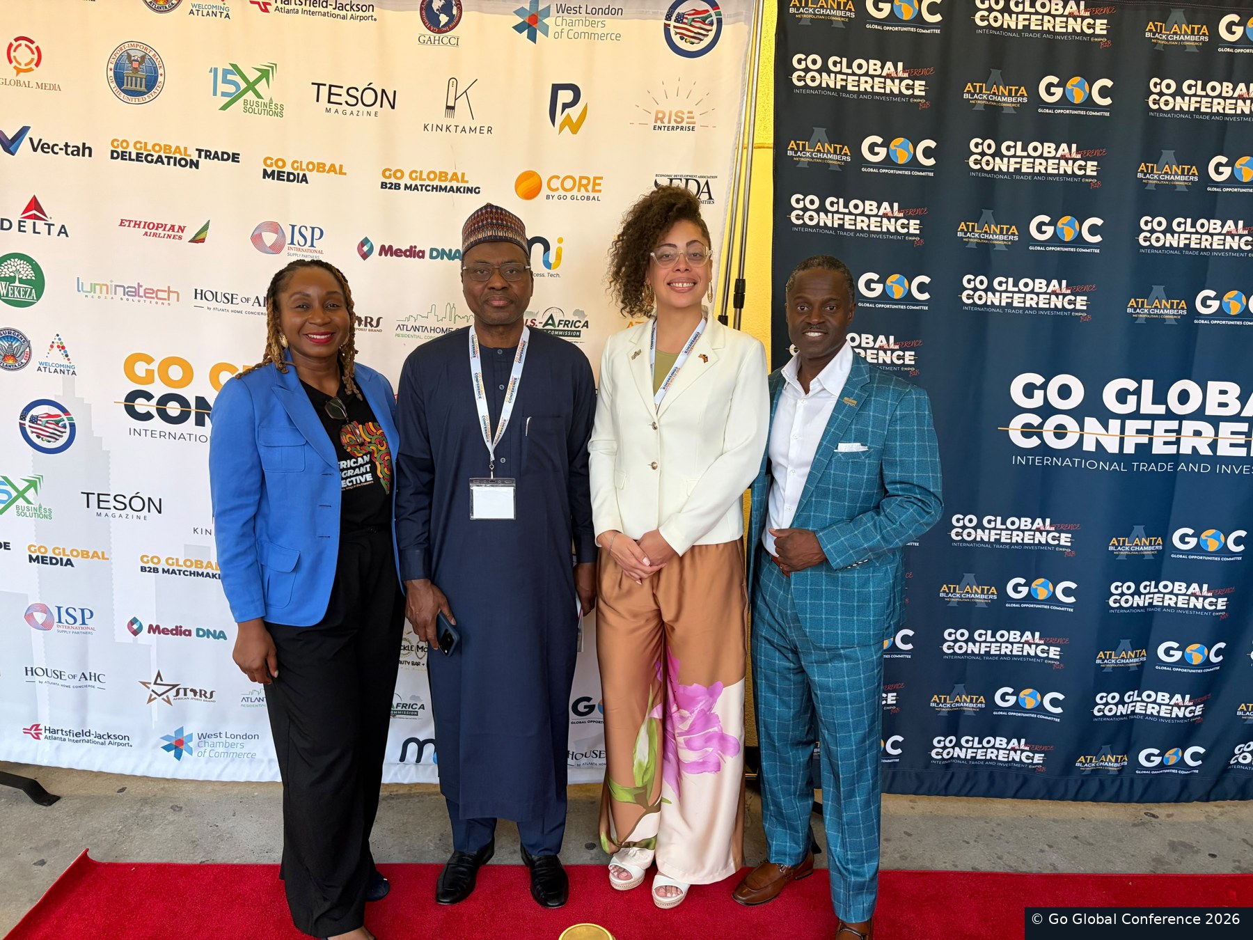 Delegates together at the reception backdrop · GGC 2026
